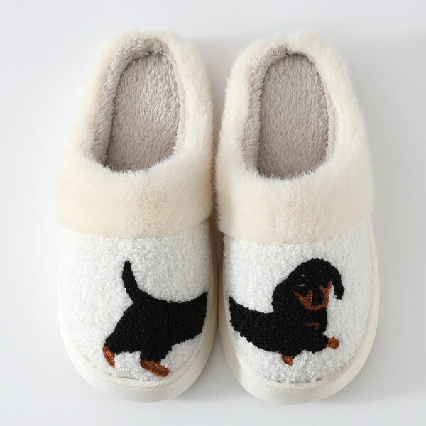 a pair of slippers with a dog on it